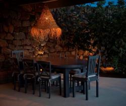 Villa-StellaMaris-Outdoor-dining-area-by-sunset