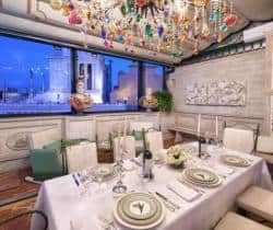 Apartment-Capitolium-Top-floor-dining-area-by-night